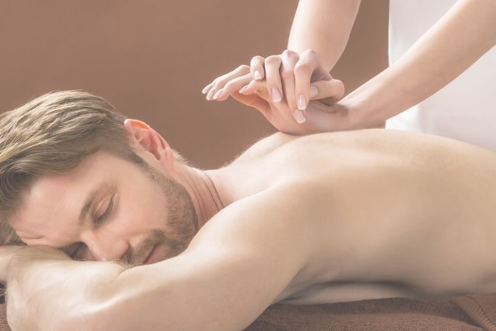 Therapist performing massage at Sanchita Family Spa